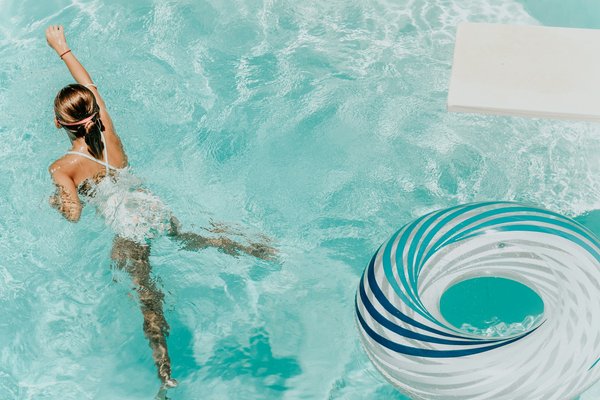What safety equipment should always be near your UK home swimming pool?